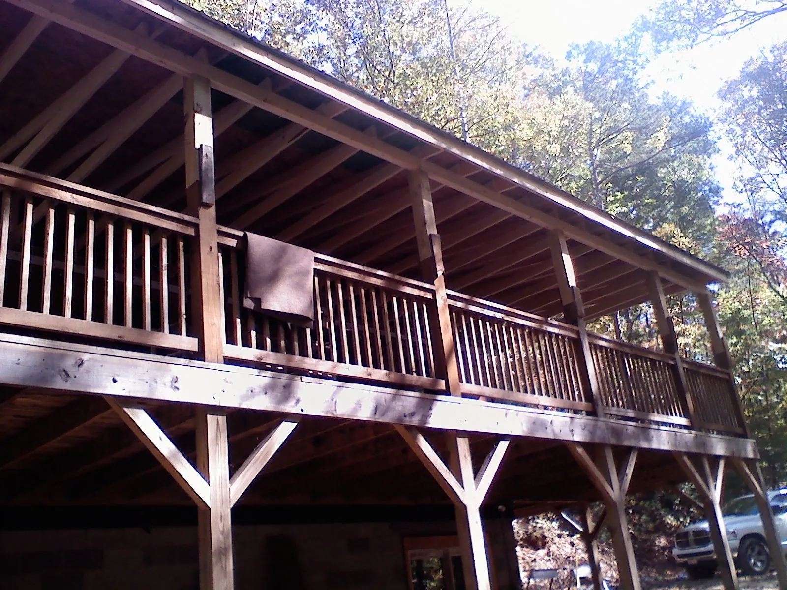 Timber framing under a new elevated porch and deck — Roof Leak Repair in Sagamore by Roofing Brothers